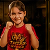 A young member in a fighting stance